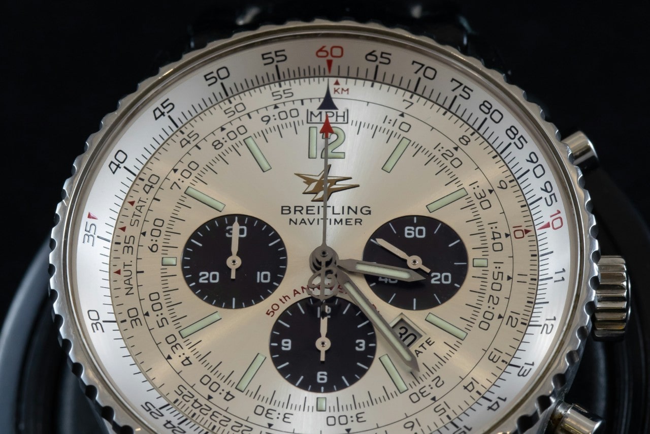 A close-up of a Breitling Navitimer dial, featuring a multitude of useful complications.